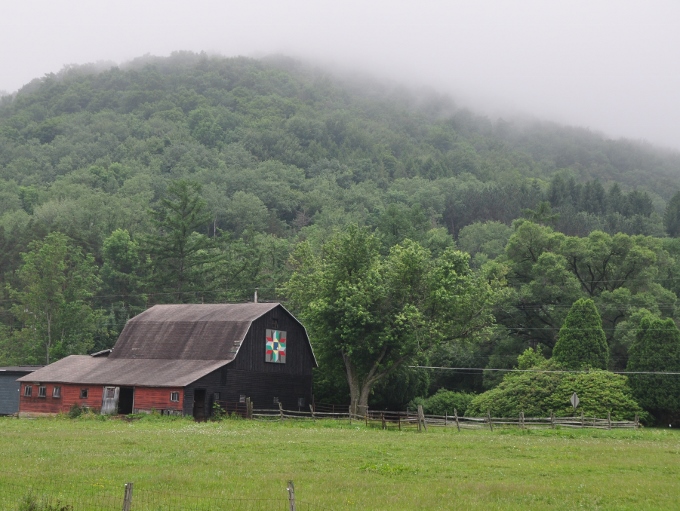 barn in the morning fog